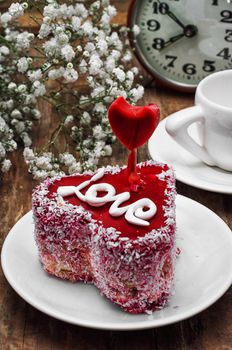 cake with fruit filling in the shape of heart with the inscription love