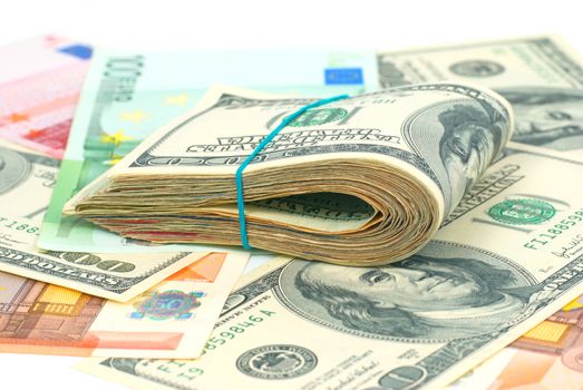 Pile of money- cash of US dollars and euros for business background
