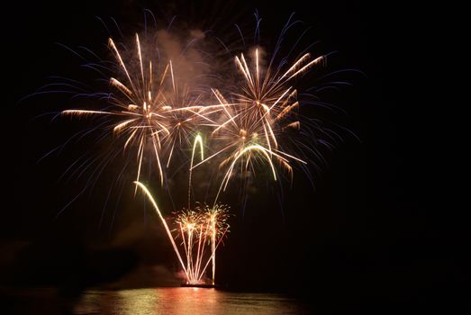 Colorful fireworks on the black sky background