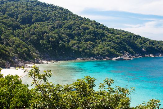 Asian Similan islands in Thailand with blue clean water and trees