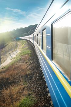 Motion train and blue wagon. Urban transportation