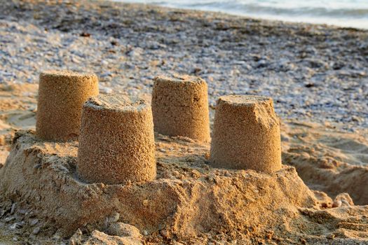 Towers from sand- castle on the beach