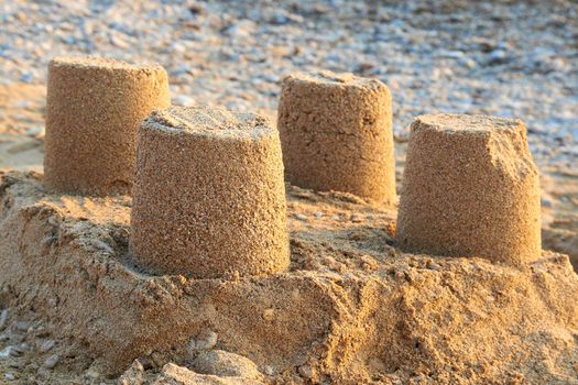 Towers from sand- castle on the beach