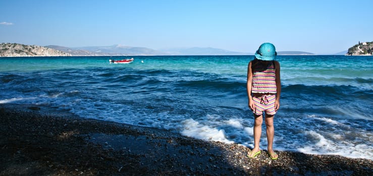 Girl at the beach in   Peloponese in Greece