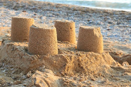 Towers from sand- castle on the beach