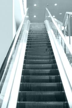 Empty escalator steps on staircase in the airport