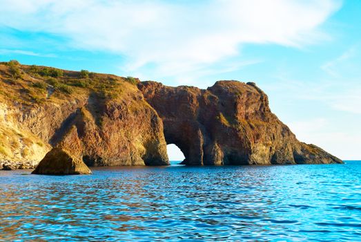 Sea landscape with grotto in the rock