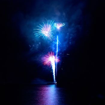 Colorful fireworks on the black sky background