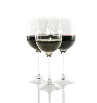 three glasses of white and red wine