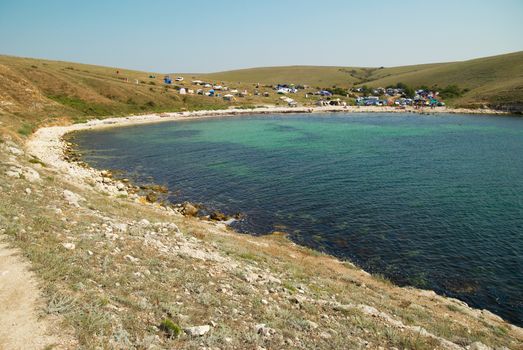 A bay with blue ocean water.