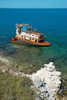 Wreck ship near the coast.