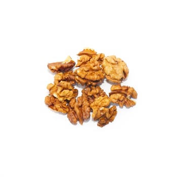 Heap of walnuts isolated on white.