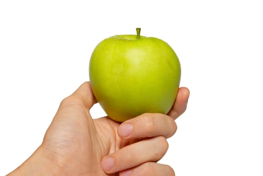 Green tasty apple in a hand isolated on white.