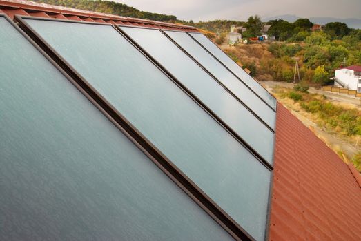 Solar panel (geliosystem) on the house roof.