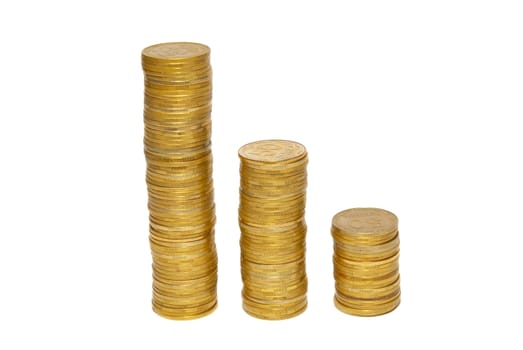 Stacks of golden coins isolated on white.