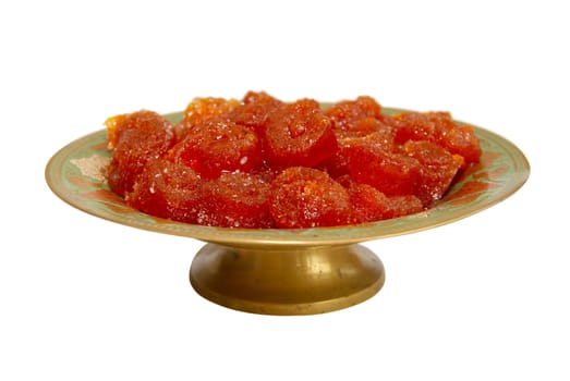 Fruit candy on the plate isolated on white.