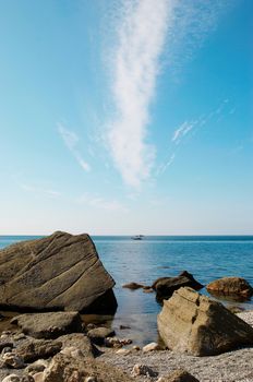 Landscape with rocks and cloud.