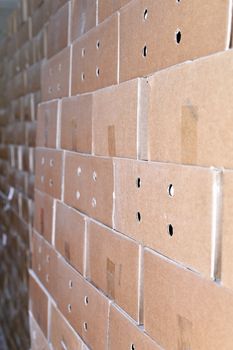 Cardboard packing boxes in a warehouse, background.