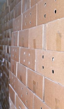 Cardboard packing boxes in a warehouse, background.