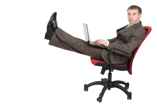 Businessman sitting on chair with laptop and legs up isolated on white background
