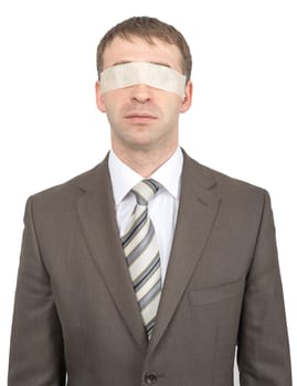 Businessman with tape over his eyes isolated on white background