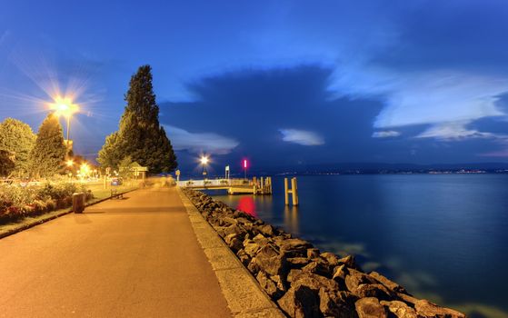 Evian-les-bains promenade near Geneva lake at blue hour, France