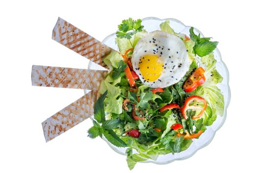 High Angle Still Life View of Green Mixed Salad Made with Fresh Vegetables and Garnished with Fried Egg and Lavash Bread Stick, Sprinkled with Seeds and Herbs on White Background with Copy Space