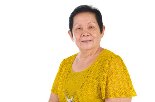 happy asian senior female smilling in the studio. senior adult asian chinese woman standing isolated white background