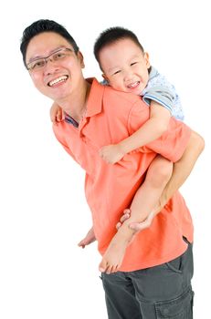 Asian father piggyback his son