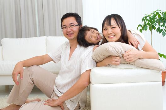 Indoor portrait of asian family