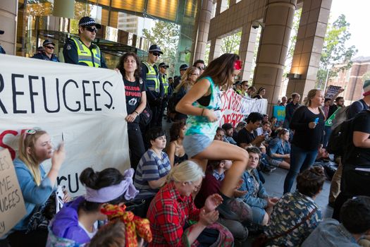 MELBOURNEAUSTRALIA - FEBRUARY 4: Refugee activists along with the Socialist Alliance and University Students, protest in Melbourne against sending children back from onshore camps to Nauru offshore centres.