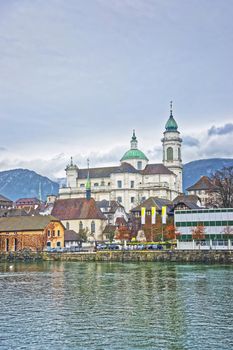 Waterfront and St Ursus Cathedral in Solothurn. Solothurn is the capital of Solothurn canton in Switzerland. It is located on the banks of Aare and on the foot of Weissenstein Jura mountains