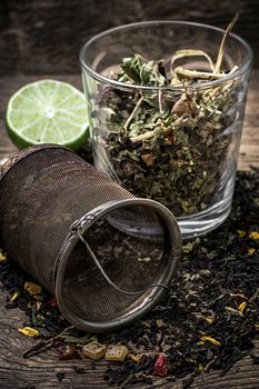 glass cup with tea brewing and tea strainer.Selective focus