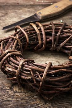 medicinal licorice rolled in  coil on wooden background.Selective focus