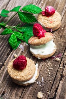 homemade shortbread with custard decorated with raspberries