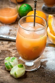 freshly squeezed citrus juice from oranges and tangerines.Selective focus.tinted