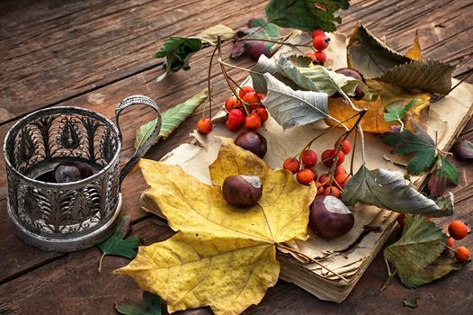 fallen autumn leaves on wooden table.Selective focus