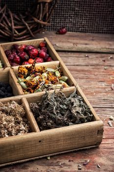 wooden box with herbs traditional medicine from home kit in the rural style.Selective focus