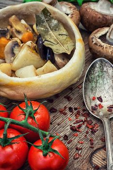 vegetable hot plate made of baked dough on wooden countertop.Photo tinted