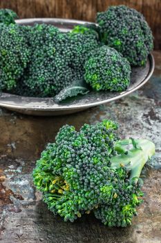 harvest broccoli cauliflower on an iron plate.