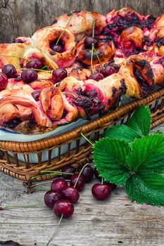 form with baked pie cherry berries in rustic style.Photo tinted