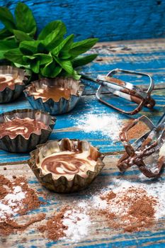 process of making coffee muffins on wooden countertop in rustic style.