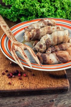 set fried meat sausages with salad on wooden background