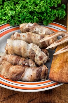 set fried meat sausages with salad on wooden background.Selective focus