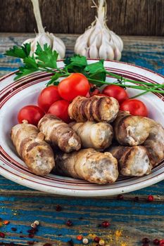 cooked meat products with spices and tomatoes