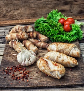 cooked meat products with spices and tomatoes
