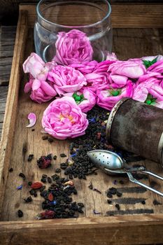 box with tea accessories herbal tea of roses.The image is tinted