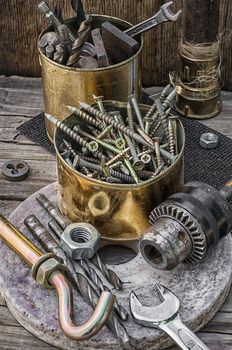 Set of old tools of the keys,screws and drills.