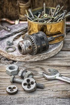 Set of old tools of the keys,screws and drills.Selective focus