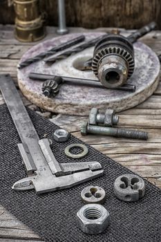 Set of old tools of the keys,screws and drills.Selective focus